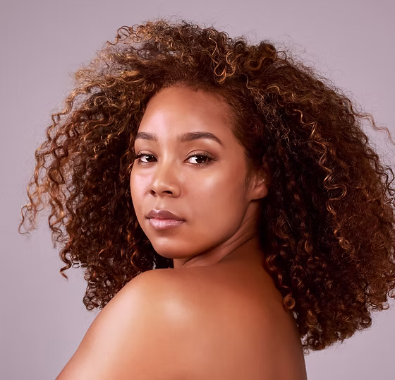 Skincare, portrait and African girl in studio with wellness, cosmetics and glowing skin re